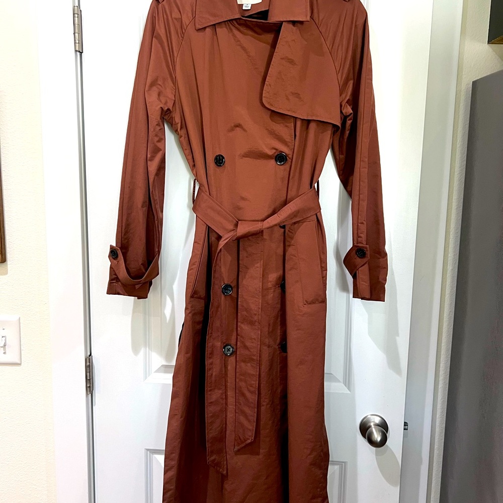 Lightweight trench coat, worn a handful of times. Size Medium.
